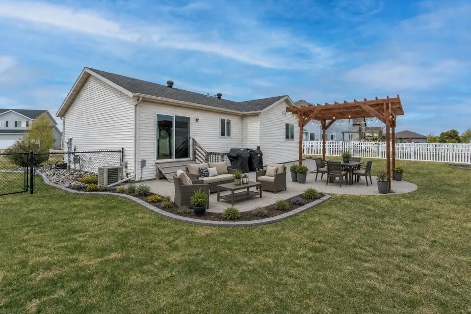 The backyard patio and pergola