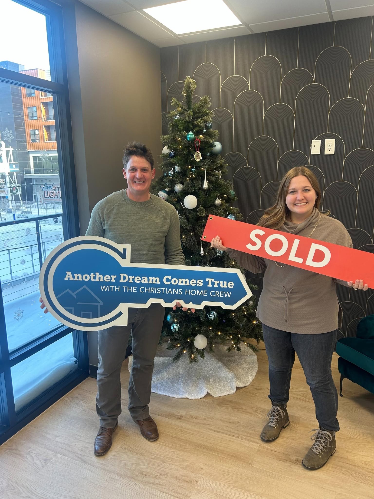 Clients celebrating a completed home sale